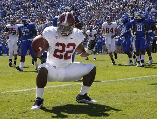 University of Alabama's running back Mark Ingram (22) celebrates his touchdown run against the University of  Kentucky during the second  half of play in their NCAA football game at Commonwealth Stadium in Lexington